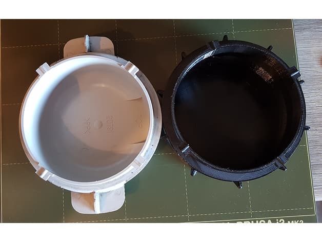 Photo of Headlight dust cap for Subaru Legacy.