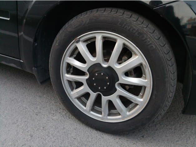 Lada Granta original wheel disk cap - image