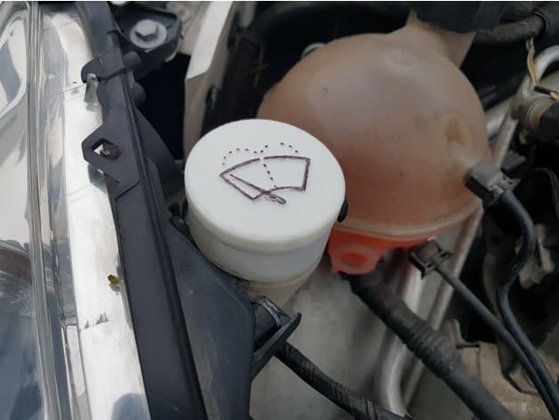 Photo of Peugeot 308 windshield washer fluid tank cap (maybe other models/makes also)